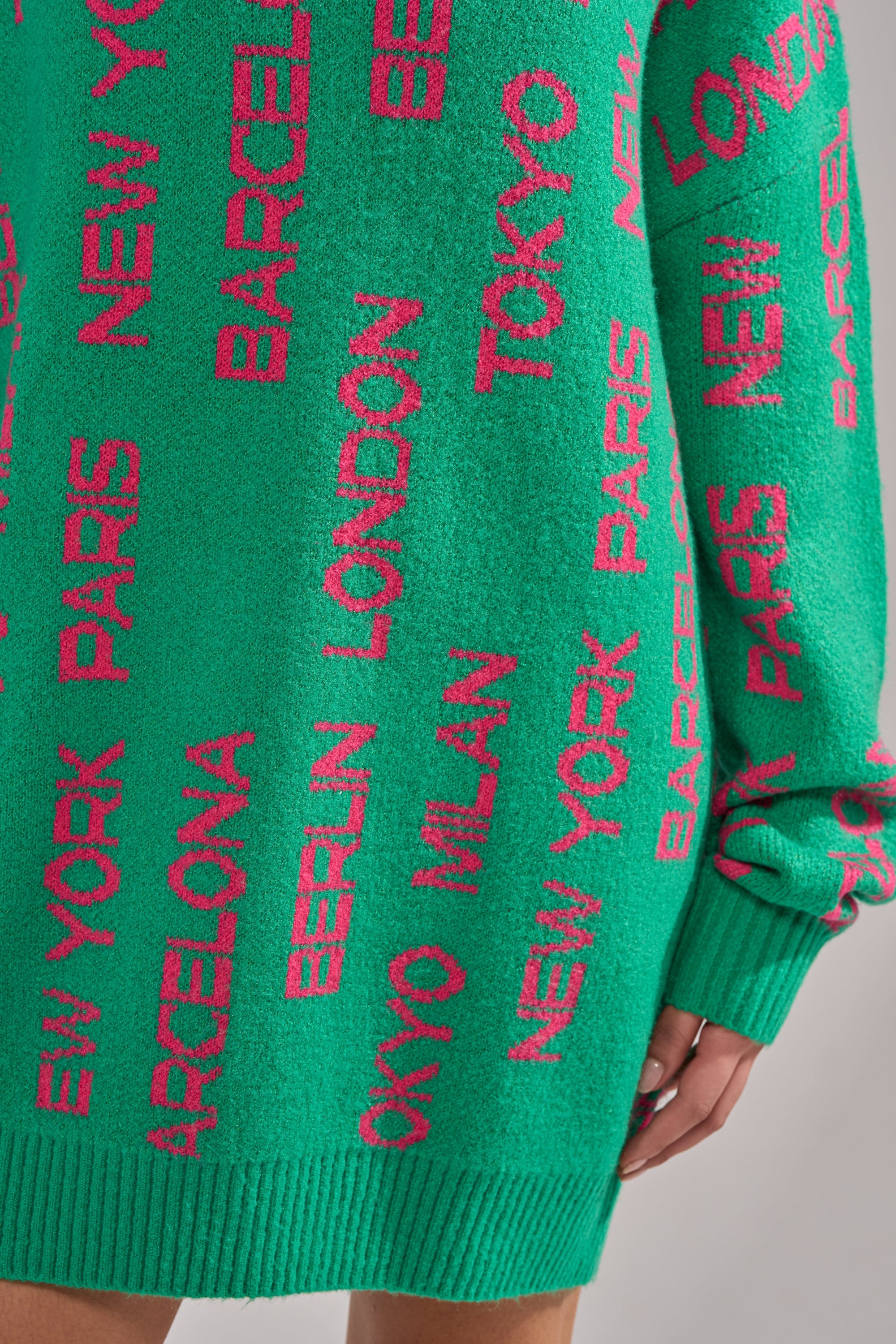 AROUND THE WORLD SWEATER MINI DRESS IN GREEN